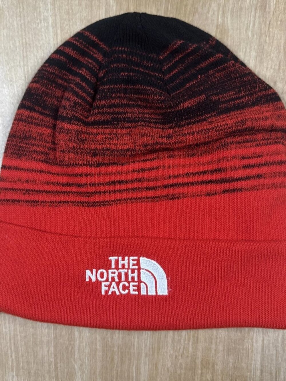 The North Face Red & Black Striped Beanie Unisex One Size.